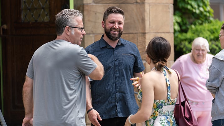 Rob Wilton interacts with attendees