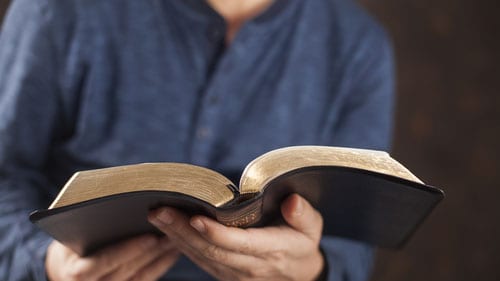 Man reading Bible