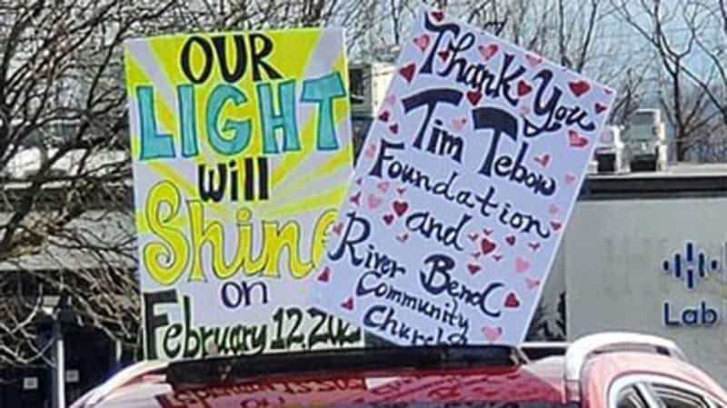 Riverbend night to shine posters on car roof