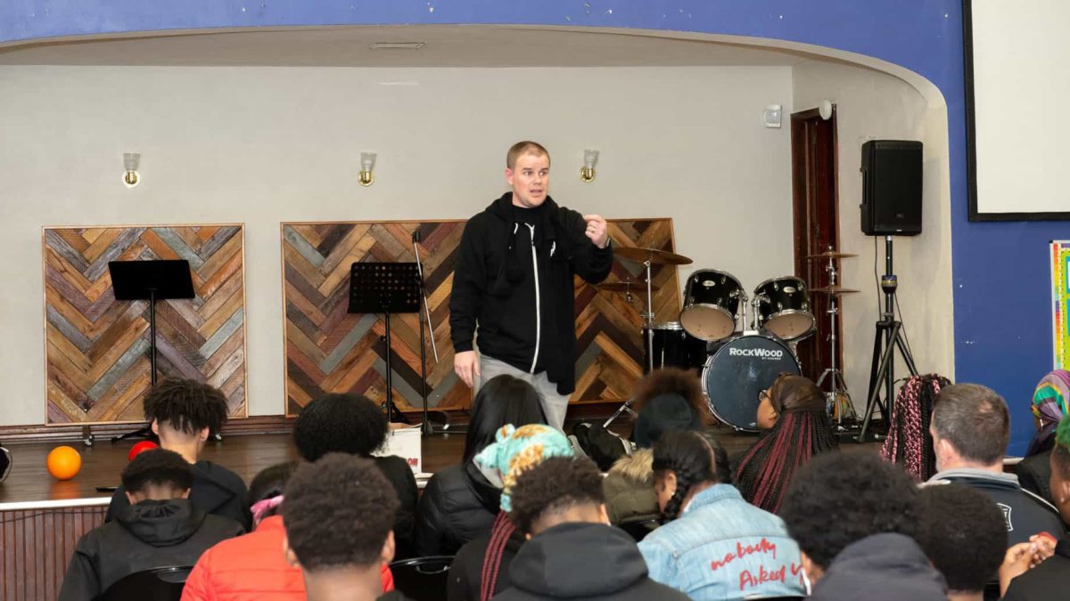 Pastor Josh Crans addressing youth at a Coatesville community center