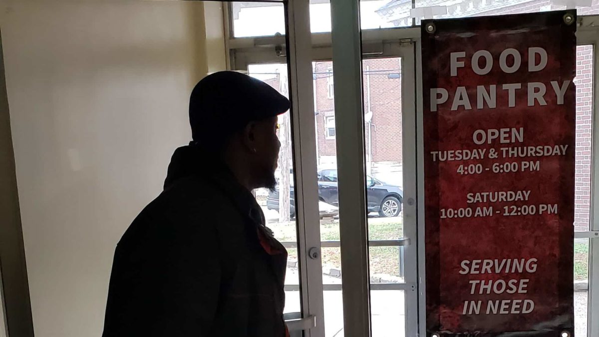 Man leaving food pantry