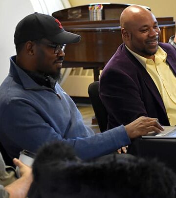 Pastors gathered at a table to discuss racial reconciliation