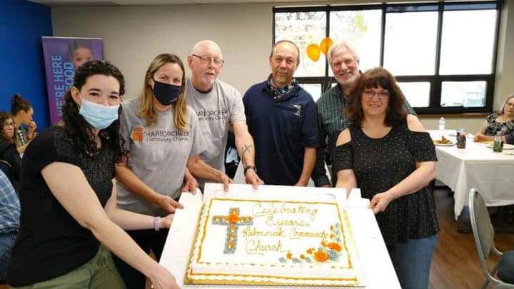 Harborcreek Community Church members with Pastor Jim Hodge (third from left)