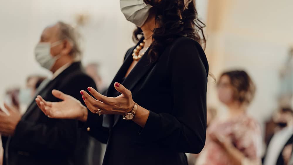 Masked church worshipers