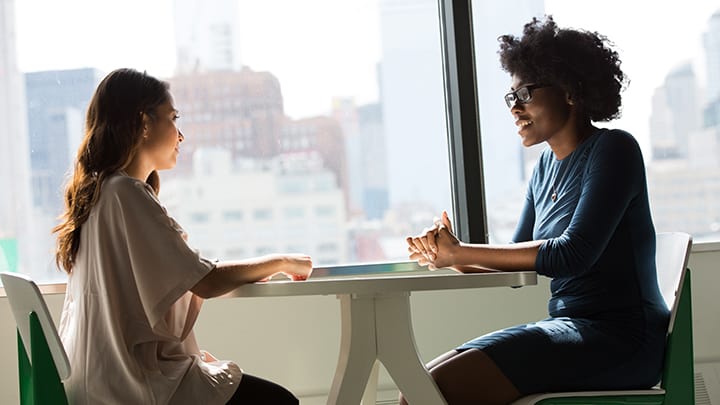 Two women talking