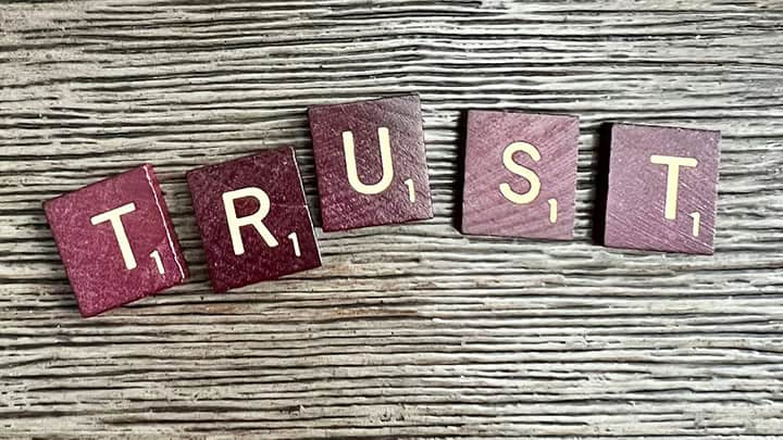 Scrabble letters spelling Trust